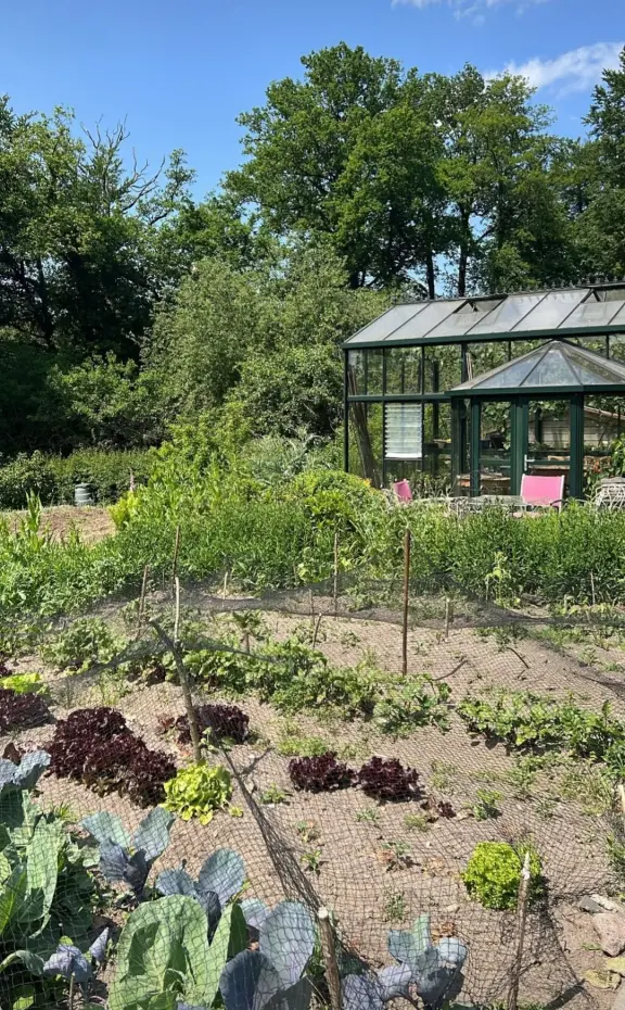Afbeelding van de werkplek 'Boscafé de Beken - Moestuin en dieren'.